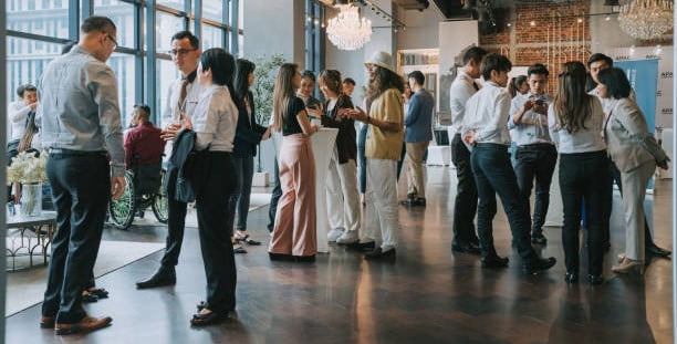 Group of multiracial Asian business person coffee break social gathering after seminar business conference
